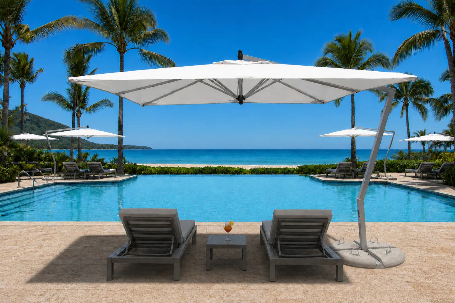 Laguna cantilever umbrellas shading a poolside setting
